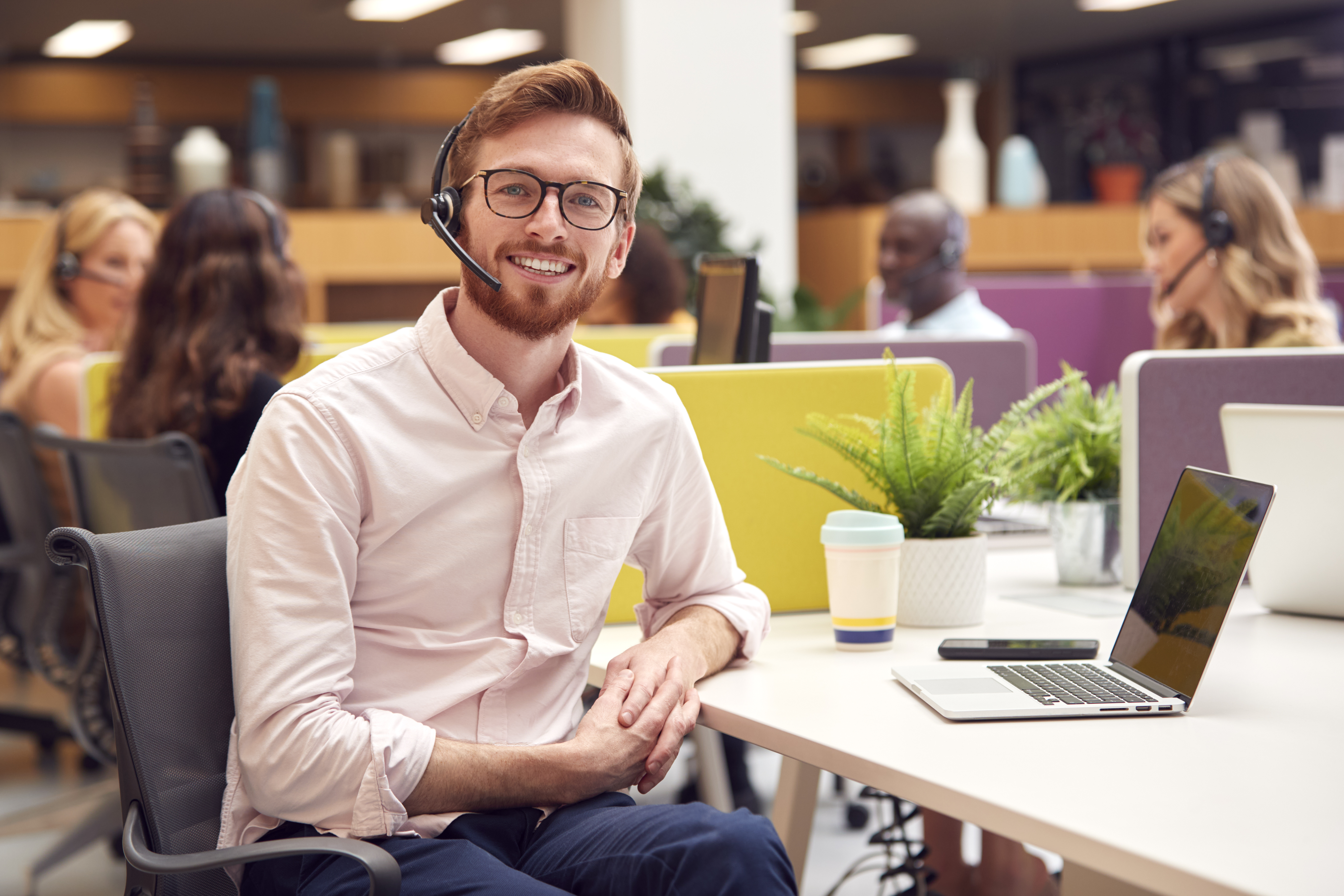 portrait-of-businessman-wearing-headset-talking-to-2021-12-09-06-50-58-utc