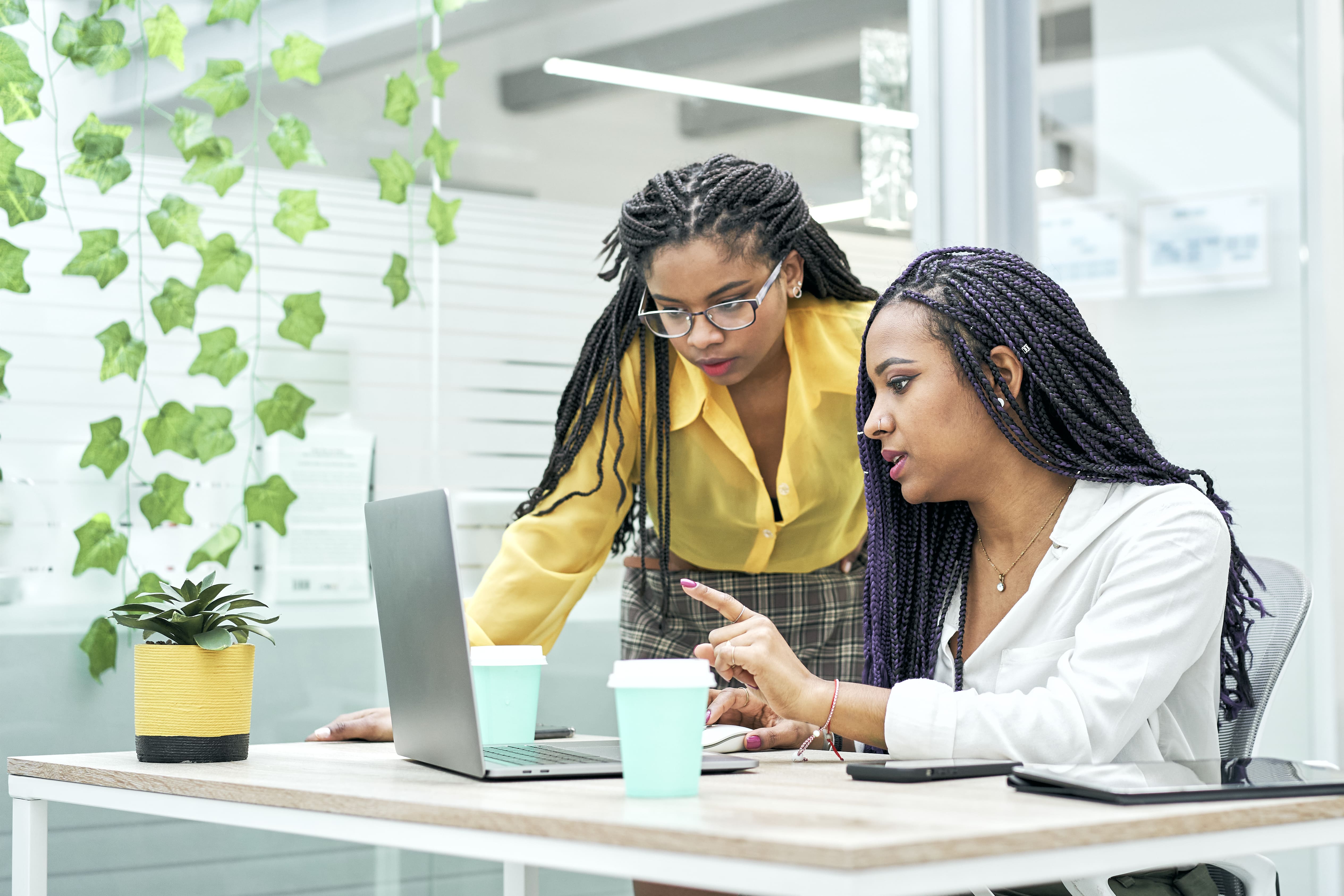 two-young-black-women-reviewing-analytical-data-on-2022-01-19-00-10-18-utc-min